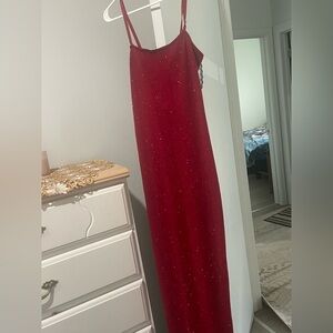 Worn once and if you want with the heels and bag is 50 but the dress alone is 30